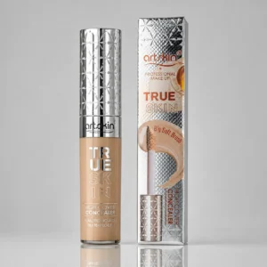 شیشه کانسیلر آرت‌اسکین True Skin به همراه جعبه نقره‌ای درخشان.
